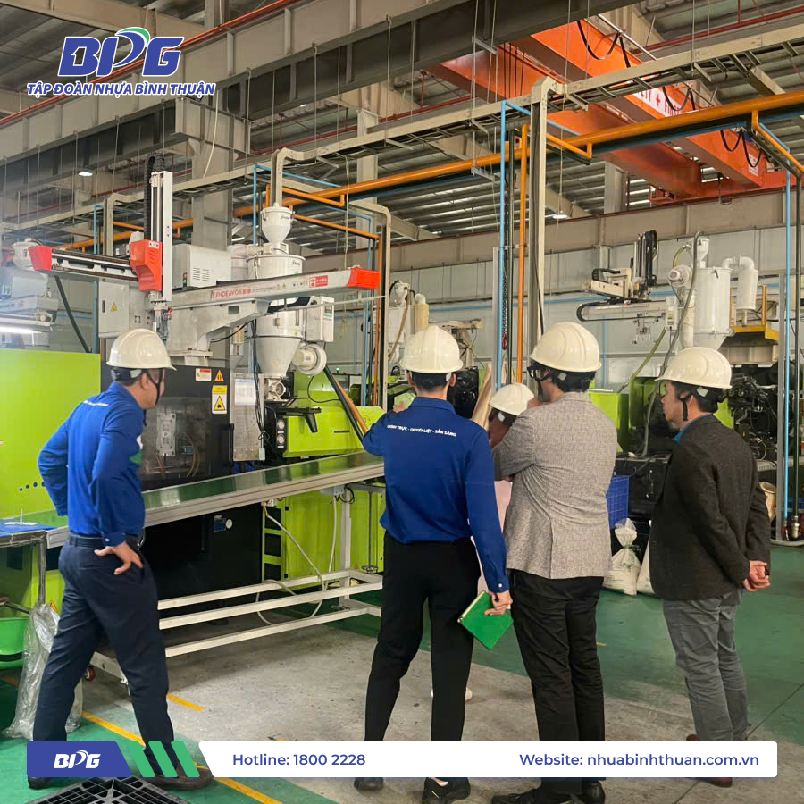 NiRoTech CEO touring the advanced production line at BQP factory, where BPG's plastic pallets and industrial plastics are manufactured